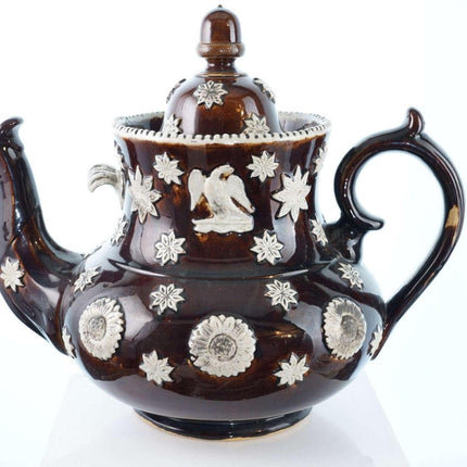 Huge 19th century treacle glazed teapot with eagle