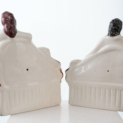 Antique Staffordshire Bookends Man and Woman reclining on sofa