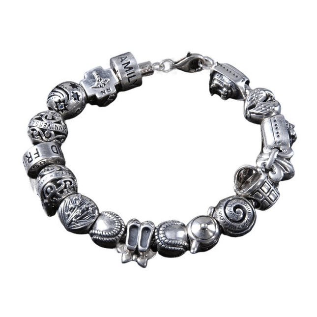 Chamilia Cham Charm-Armband aus Sterlingsilber mit 17 Charms