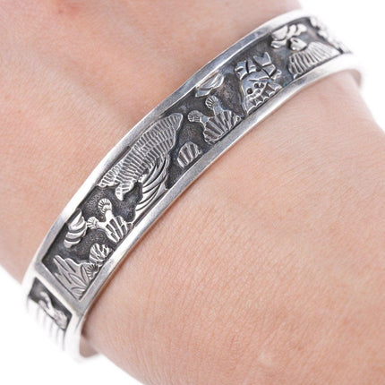 8.5" Floyd Becenti (1962-2016) Navajo sterling storyteller bangle