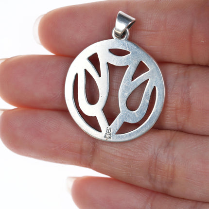 Retired James Avery descending dove in circle Pendant in sterling