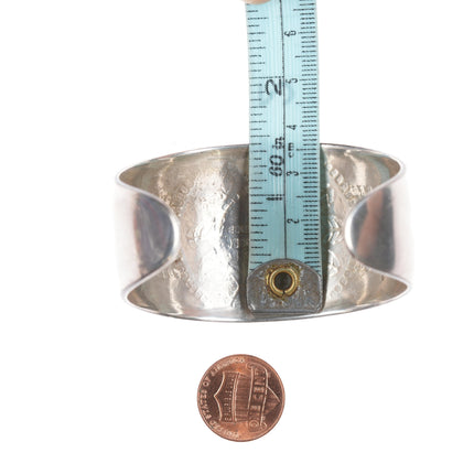 6.75" Bernard Dawahoya (1936-2010) Hopi Overlay silver cuff bracelet with sunface