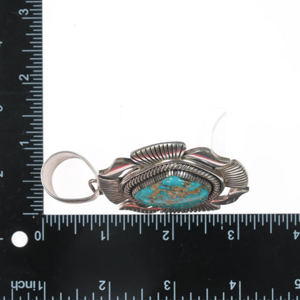 Large Paul Livingston Navajo sterling pendant with turquoise