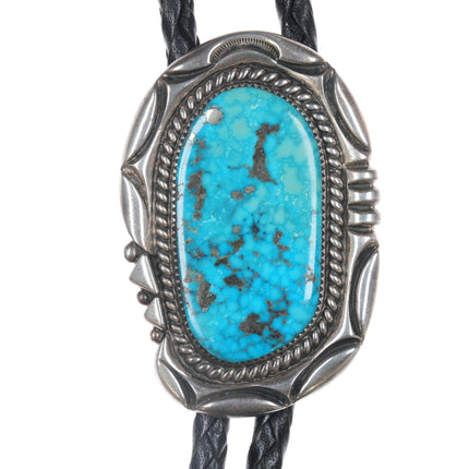 Orville Tsinnie (1943-2017) Large silver and turquoise bolo tie