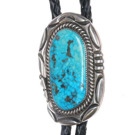 Orville Tsinnie (1943-2017) Large silver and turquoise bolo tie