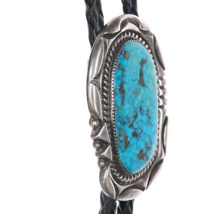 Orville Tsinnie (1943-2017) Large silver and turquoise bolo tie