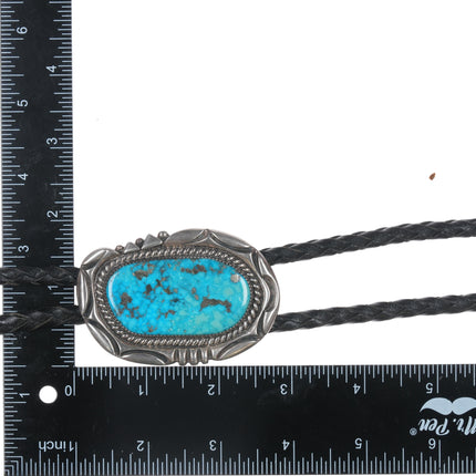 Orville Tsinnie (1943-2017) Large silver and turquoise bolo tie