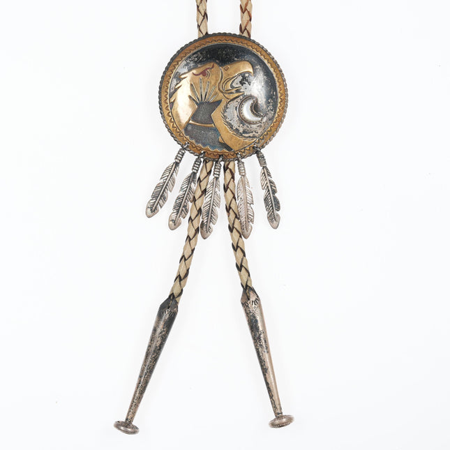 Vintage Sterling and Brass Native American bolo tie with mother of pearl