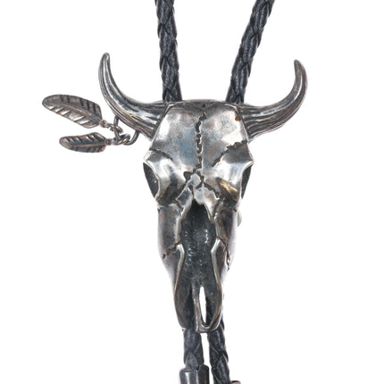 Vintage Sterling cow skull bolo tie with feather dangles