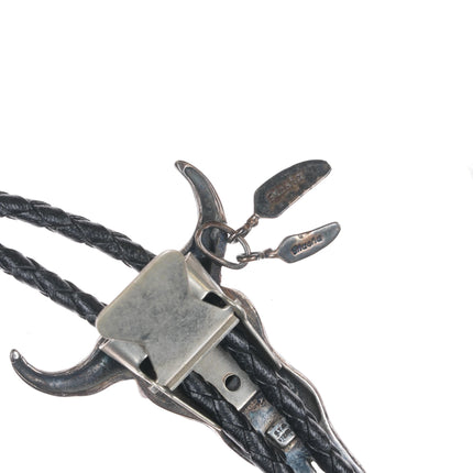 Vintage Sterling cow skull bolo tie with feather dangles