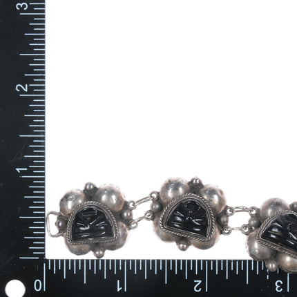 7" 1940's Mexican silver molded glass masks bracelet