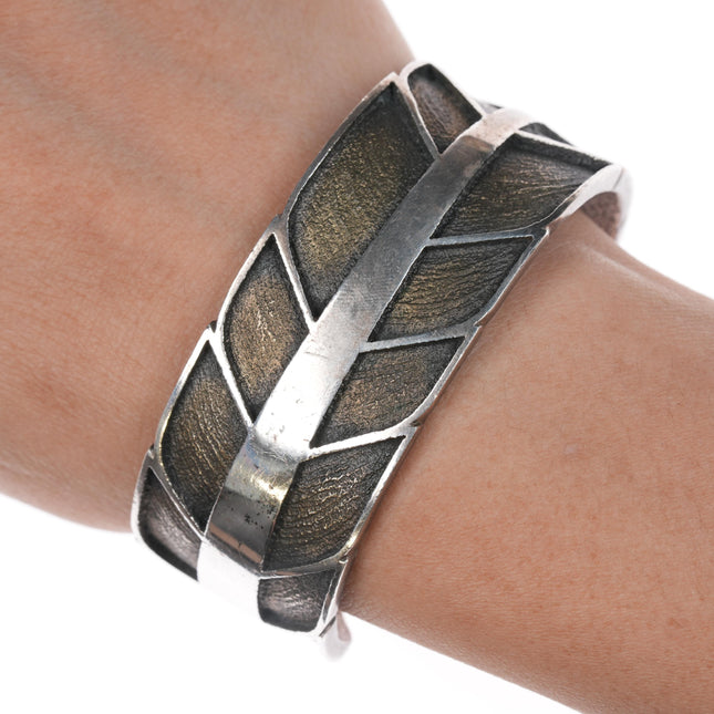 6.25" Ric Charlie Navajo Tufa Cast silver feather cuff bracelet