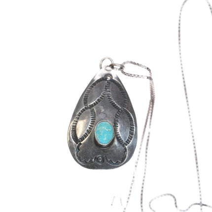 Vintage Navajo silver hand stamped pendant with turquoise