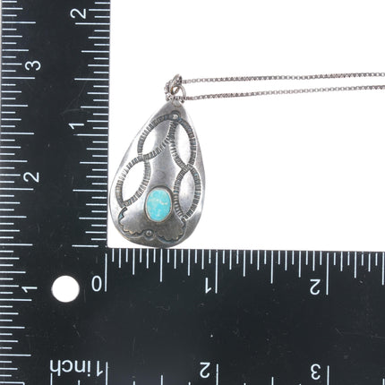 Vintage Navajo silver hand stamped pendant with turquoise