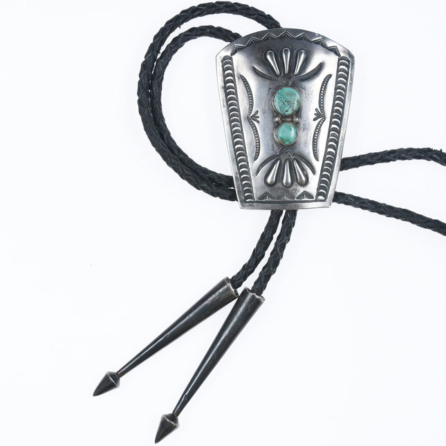 Vintage Navajo hand stamped silver bolo tie with turquoise