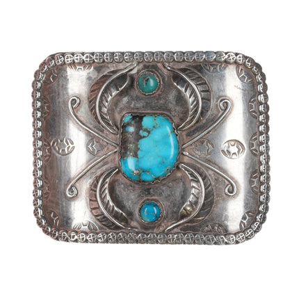 Vintage Navajo silver and turquoise belt buckle with feather designs