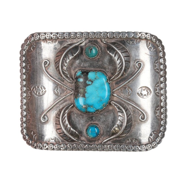 Vintage Navajo silver and turquoise belt buckle with feather designs