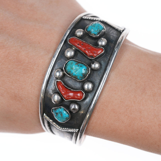 6 3/8" vintage Native American silver, turquoise, and coral cuff bracelet with rope border