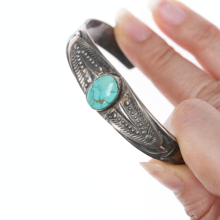 6.75" 30's-40's Navajo silver and turquoise bracelet with stars stampings