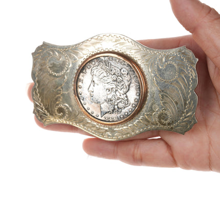 Comstock  1882 Silver dollar belt buckle in "German Silver" frame