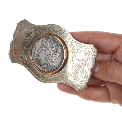 Comstock  1882 Silver dollar belt buckle in "German Silver" frame