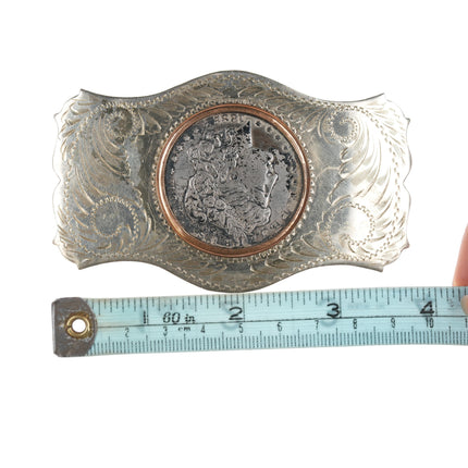 Comstock  1882 Silver dollar belt buckle in "German Silver" frame