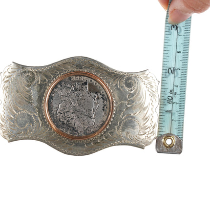 Comstock  1882 Silver dollar belt buckle in "German Silver" frame