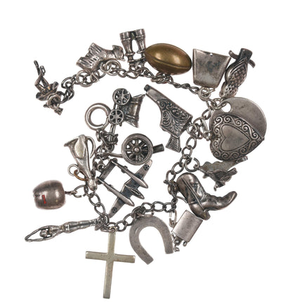 6.5" Vintage Sterling charm bracelet loaded with charms