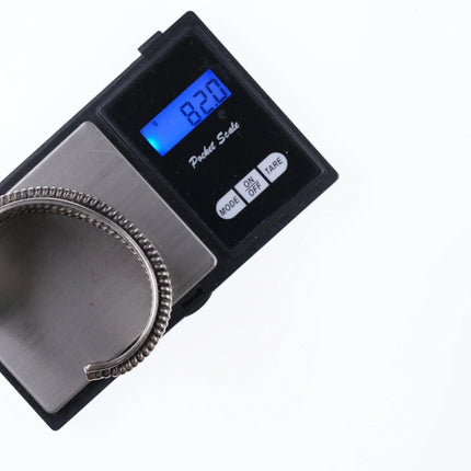 6.75" Tahe Navajo stamped silver twisted wire bracelet - Estate Fresh Austin