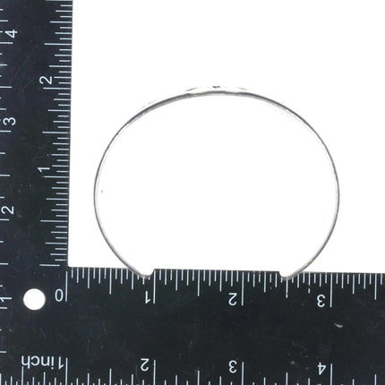 7.25" Tony Kyasyousie Hopi Overlay Man in the Maze Paw sterling cuff bracelet - Estate Fresh Austin