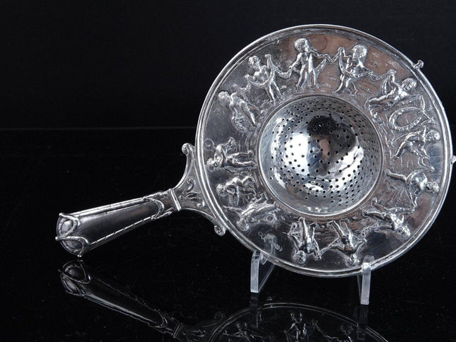 800 Silver Tea Strainer Allegorical Cherubs dancing and playing instruments - Estate Fresh Austin