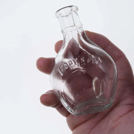 c1890 "Oriental Nurser" and comedy baby bottle flask Teddy's Pet - Estate Fresh Austin