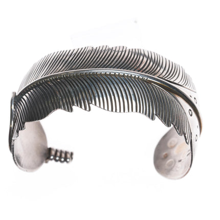 7 1/8" Douglas Etsitty Navajo sterling feather cuff bracelet and pendant