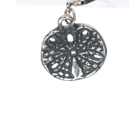 Retired James Avery Sand dollar dangle earrings in sterling