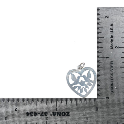 Retired James Avery doves in heart pendant sterling