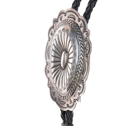 Marcella James Navajo heavily stamped sterling bolo tie