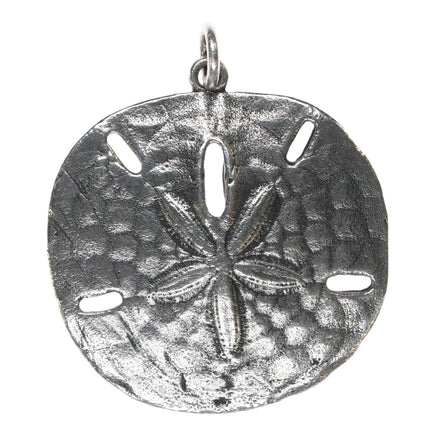 Retired James Avery sand dollar pendant in sterling