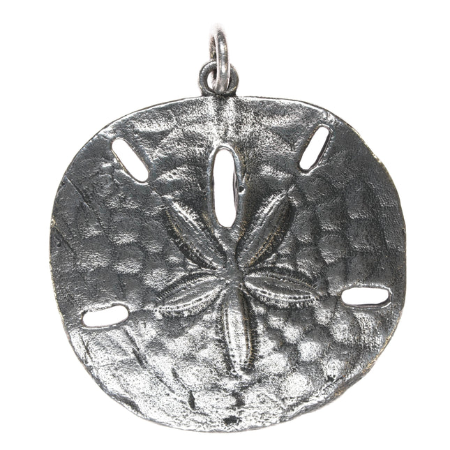 Retired James Avery sand dollar pendant in sterling