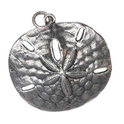 Retired James Avery sand dollar pendant in sterling