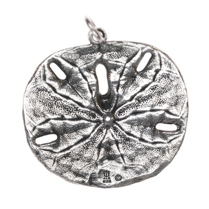 Retired James Avery sand dollar pendant in sterling