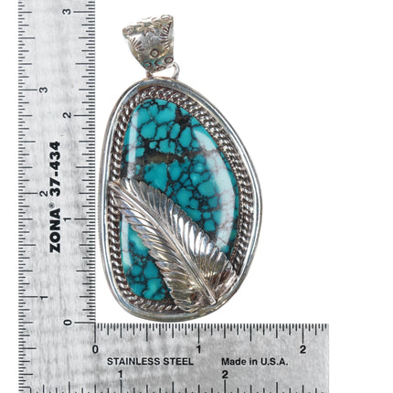 TQ+ Sterling Handcrafted spiderweb turquoise pendant