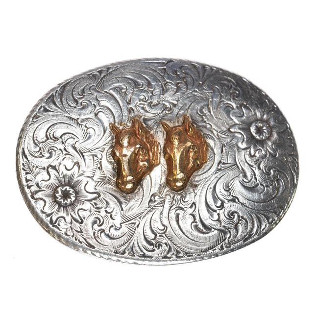 1980's Vogt Sterling front Cowboy belt buckle with Horse Heads