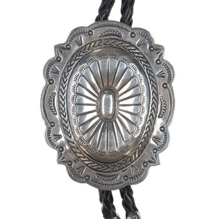 Marcella James Navajo heavily stamped sterling bolo tie