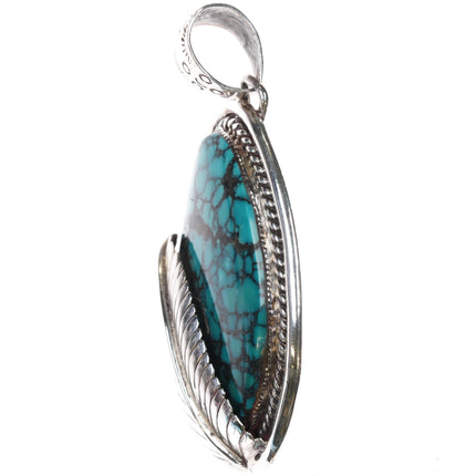 TQ+ Sterling Handcrafted spiderweb turquoise pendant