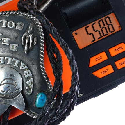 c1970 Frank Patania jr "Caballeros del Sol" Sterling/turquoise bolo tie - Estate Fresh Austin