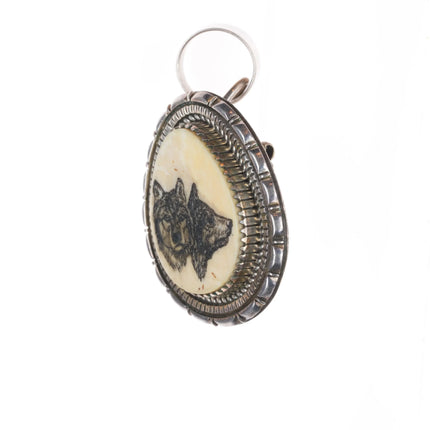 Artie Yellowhorse Navajo sterling silver hand carved wolves pendant/pin