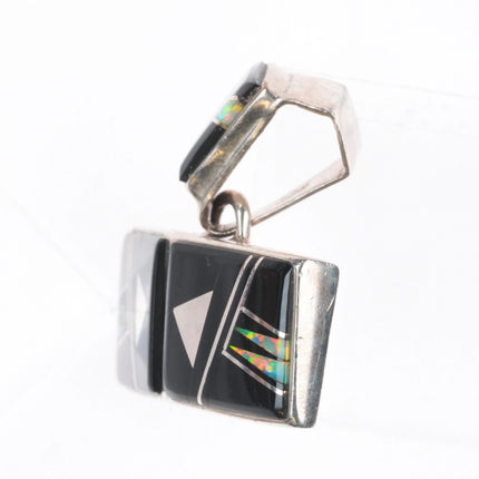 Calvin Begay Navajo sterling silver, onyx, opal inlay pendant