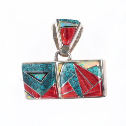 Calvin Begay Navajo sterling silver, spiderweb turquoise/coral inlay pendant