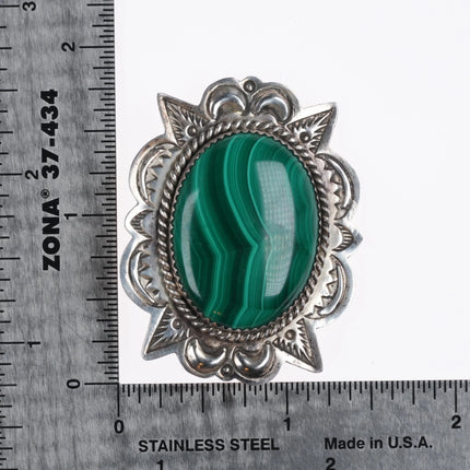 A Secatero Navajo sterling silver malachite hand stamped pendant/pin