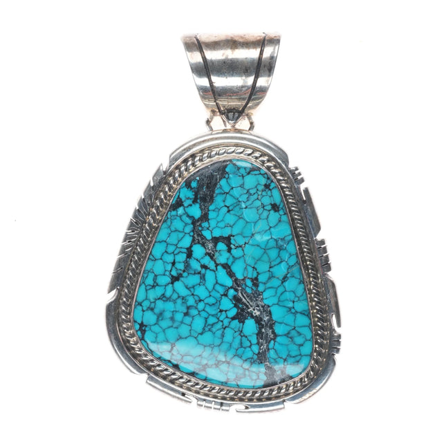 1980's Large Jon McCray Navajo sterling silver spiderweb turquoise pendant